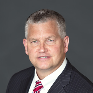 David L.  Larson President & CEO